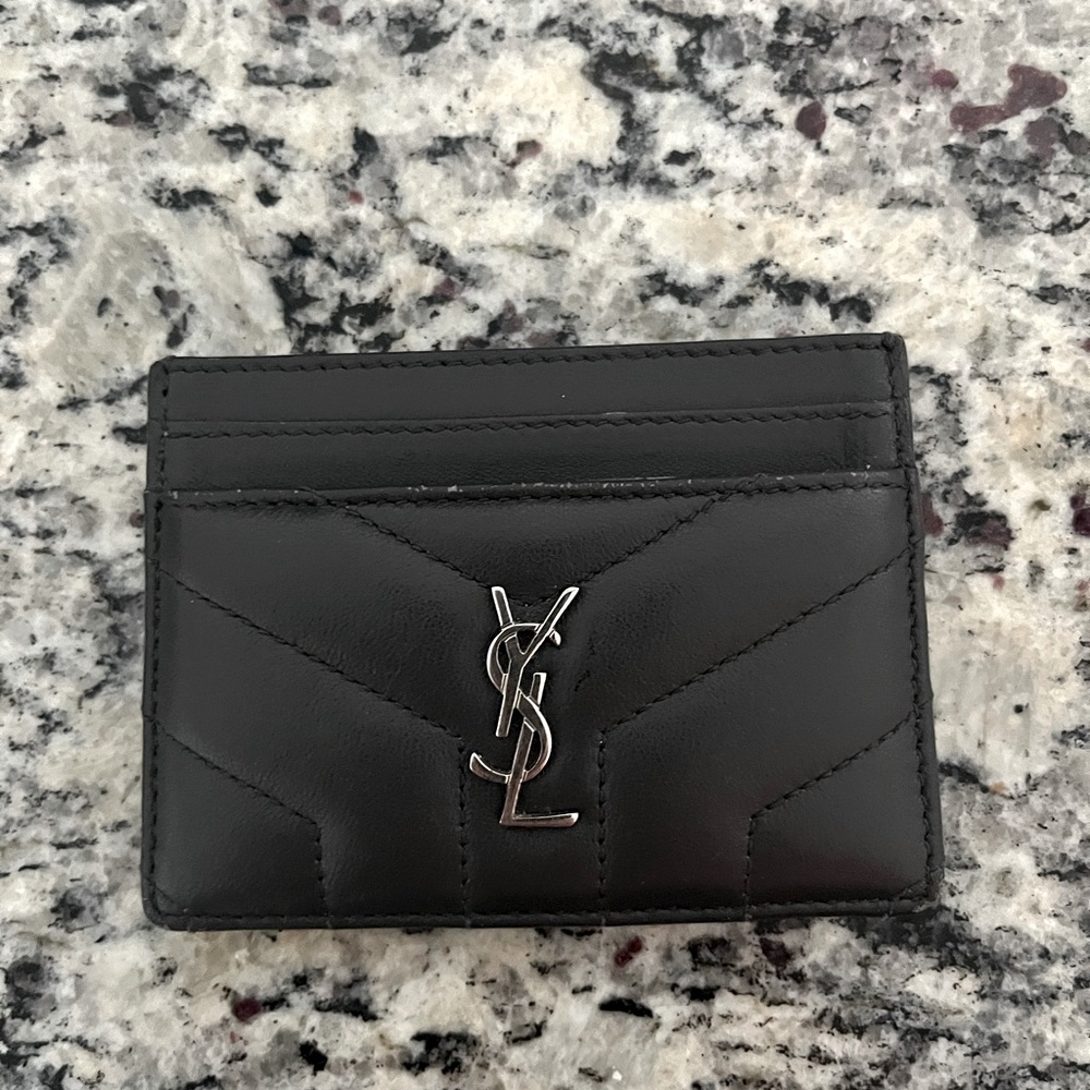 YSL soft lambs leather card hold with silver logo. Has some wear on it. 👀at pic